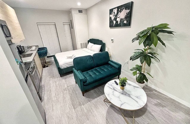 A lush, green-themed retreat home in Des Moines’ vibrant East Village.