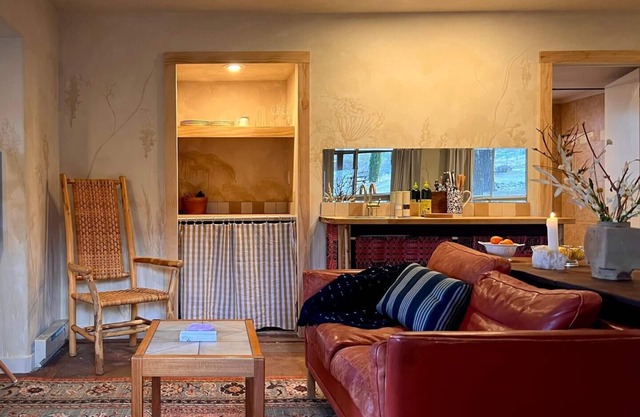 A private king studio with a kitchenette in the garden of Halliday House.