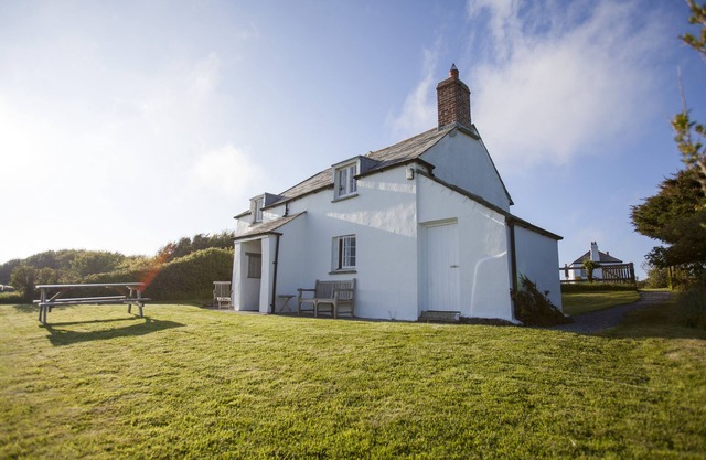 Una cabaña tradicional de Cornualles de granja con la espectacular Costa Vistas