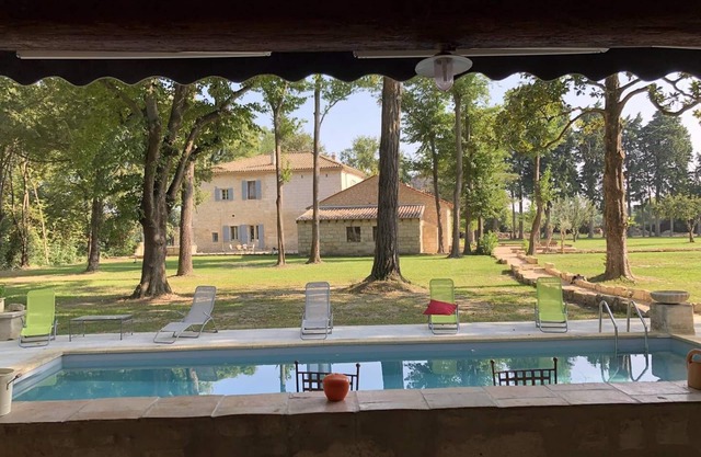 Air-conditioned Provencal farmhouse in Beaucaire, Gard, with games room and heated pool.
