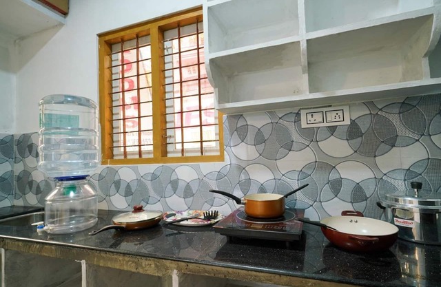 Estancia en casa amigable cerca de la autopista nacional / Munnar