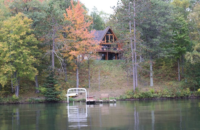 An Iconic Private Retreat on Beautiful Red Cedar Lake
