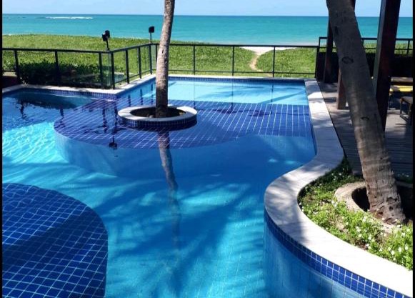 Apartamento beira mar em Guaxuma, pé na areia