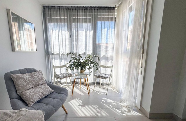 Apartamento 'Boutique Sol y Mar' con piscina compartida, Wi-Fi y aire acondicionado