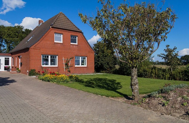 Apartamento 'Ferienhaus Norderhof Hansen' con jardín compartido y Wi-Fi