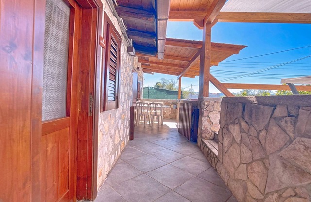 Apartamento 'La Mignola - Bilo 2 - Duplicado' con Jardín Compartido, Wi-Fi y Aire Acondicionado