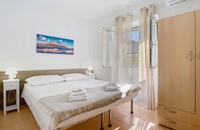 Apartamento 'La Mignola - Quadri 6' con Terraza Privada, Wi-Fi y Aire Acondicionado