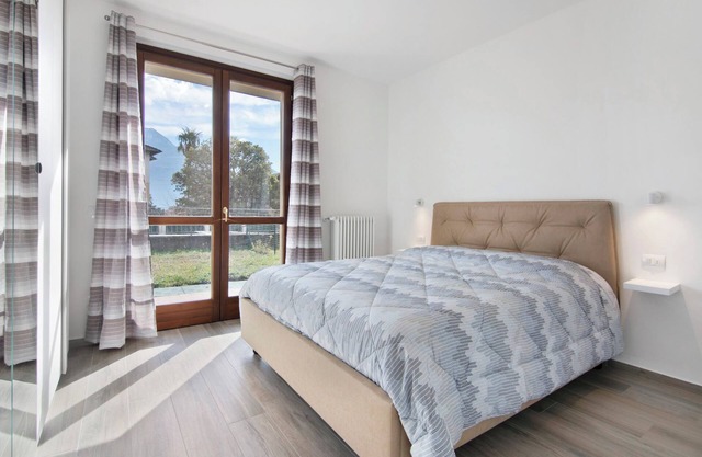 Apartamento "Orange Corner - Gravedona" con vistas a la montaña, terraza y Wi-Fi