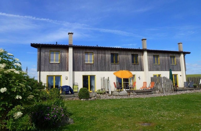 Apartamento "Poggenkrug Halbsguth" con vistas al lago, terraza privada y Wi-Fi