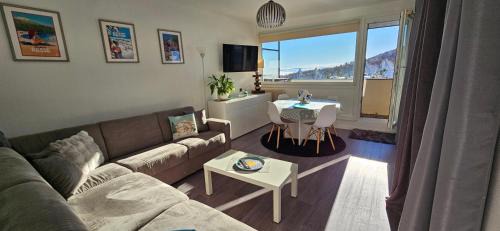 Appartement terrasse pied des pistes coeur station wifi