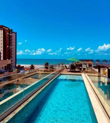 Apt 2 quartos com Vista Mar Piscina e Varanda 200 m da Praia Ilheus BA