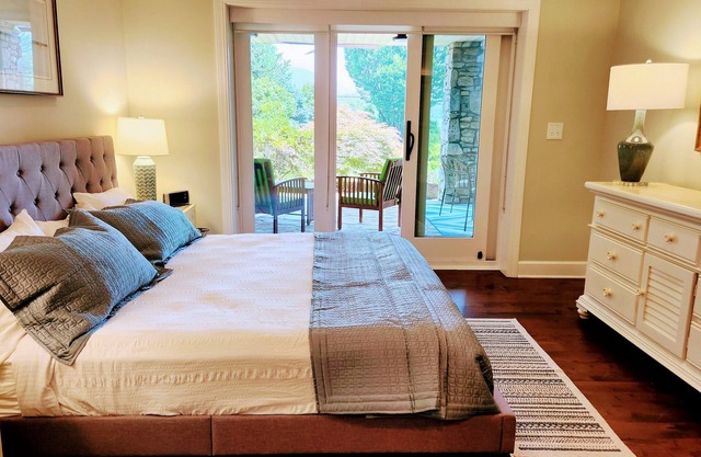 Asheville mountain and lake views! Fireplace, heated pool, patio. Pet friendly!