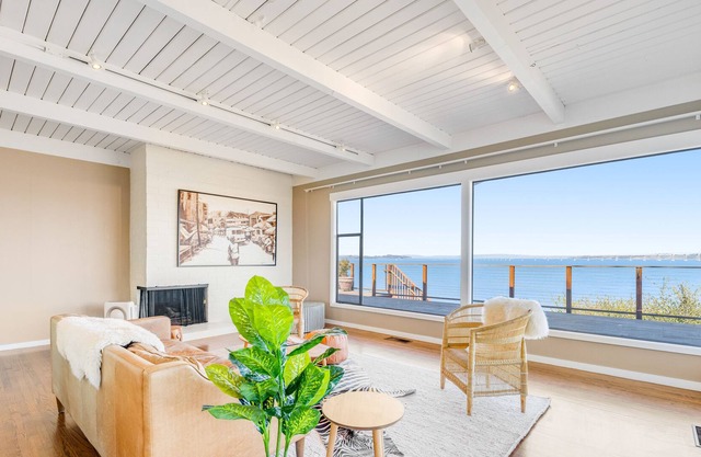 Bay-view home + detached in-law suite with huge deck, sunroom, & gas fireplace