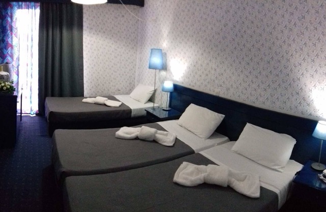 Beachfront Triple Room- Argo Seaside Stays