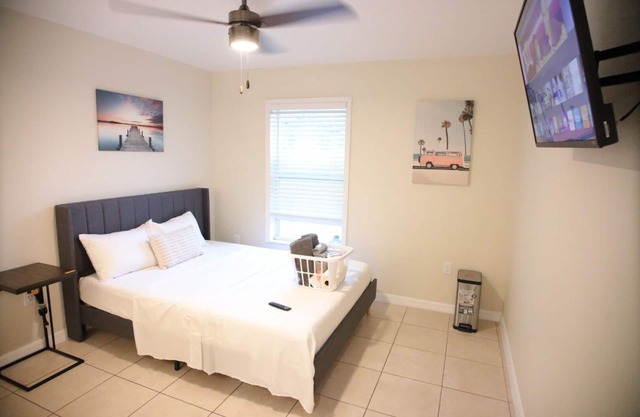 Beachy Oasis Queen Bedroom with Shared Lavatory
