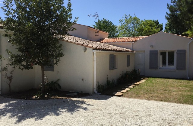 Pretty Beach House con una ubicación número 1