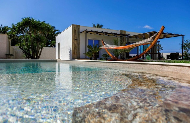 Estupenda casa de vacaciones privada con piscina privada, WIFI, A/C, TV, patio y mascotas permitida