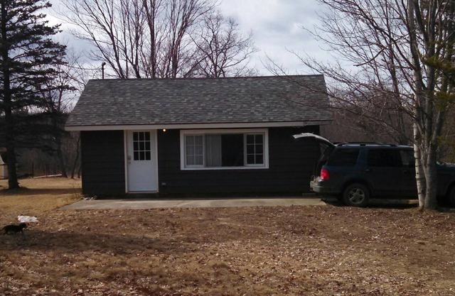 Cabina por rama del norte del río de AuSable Lovells, MI - Guía de Pesca con Mosca Servicio
