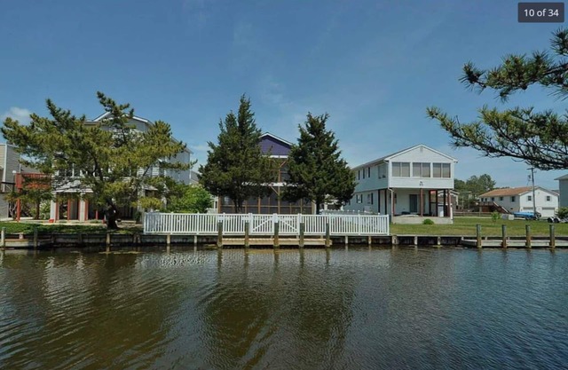 Canal Front Home con muelle y valla. 5 minutos a pie de la playa! Mascota amigable