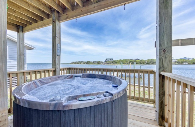 Canalfront Dog Friendly Home w/ Hot Tub, Smart TVs, and Private Boat Dock