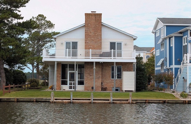 Canalfront Retreat w/ Dock, Kayaks & Screened Porch – Pet-Friendly!