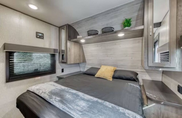 Cozy Retreat on Wheels: Charming RV Trailer