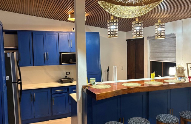 Charming 2-bedroom lake front house in El Guayabo, Granada with AC, WiFi.