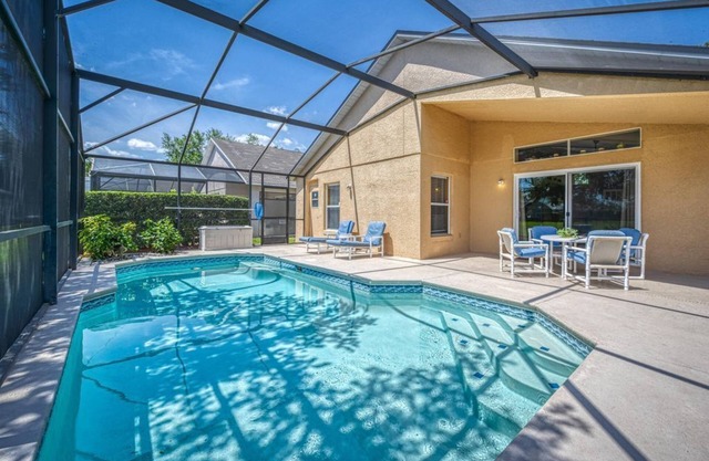 Charming 3BR home in Kissimmee with private pool and lake view, perfect for families.