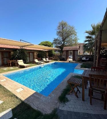 Charming Poolside Stone Studios