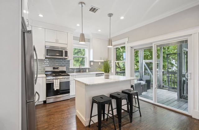 Clean, Contemporary Duplex | Sleeps 17