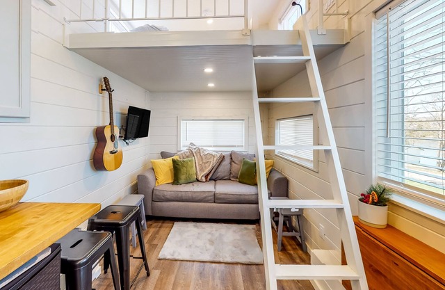 Contemporary tiny home with lake view, private W/D, firepit & gas grill