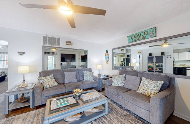 Convenient first-floor condo with a fully stocked kitchen, WiFi & a private deck