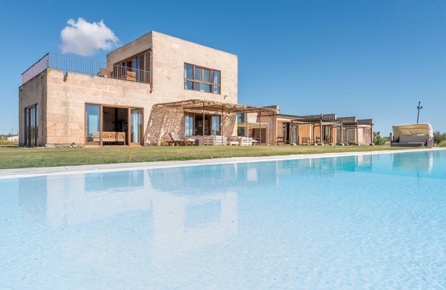 Maravillosa casa con a/a, piscina, jardín, terraza y Wi-Fi; Estacionamiento; Mascotas permitidas