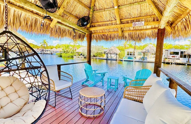 Cozy Waterfront Retreat w/ Private Boat Dock + Tiki