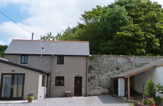 Acogedora casa de campo, confortable y de buen gusto con grandes terrenos. Newton de 3 millas de arena y que admite perros