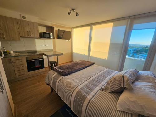 Depto Full Equipado en Centro de Chillán con Estacionamiento 10