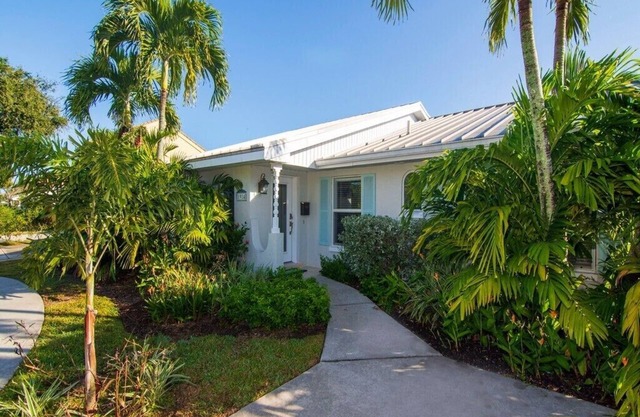 Direct water access! Watch the dolphins and manatees in the back yard.