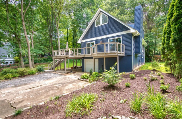 Dog-friendly home with deck, gas fireplace, central AC, & washer/dryer