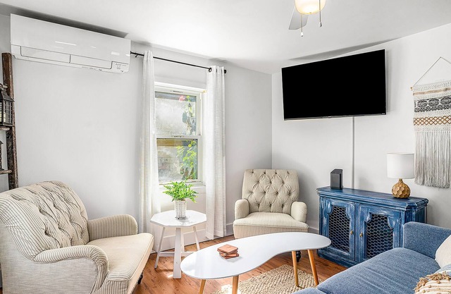 Dog-friendly retreat near the lake with charming fixtures, large yard, & firepit