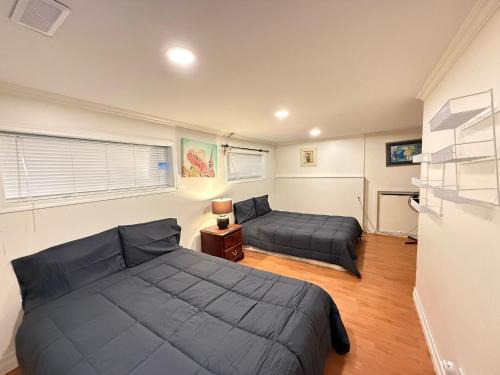 Downtown Central City Cozy Private 2 Bedroom Basement Suite - Independent Entry