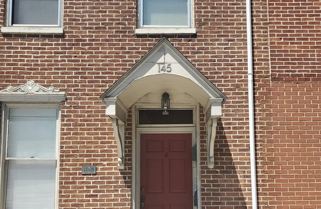 Downtown location w/ parking. Transit stop across the street. Unit 4 of 4.