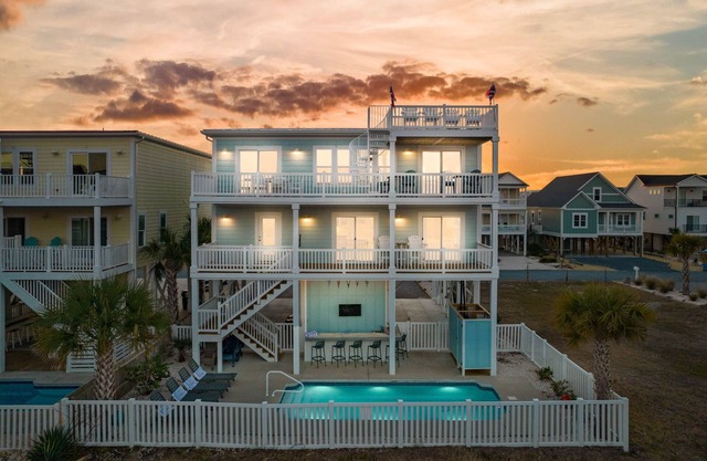 Easy Breezy is a stunning 4 bedroom, 4 bathroom house with a private pool and elevator