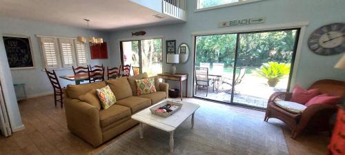 End Unit at Club Villas! This gorgeous, coastal coastal inspired villa is the ultimate beach-pad!