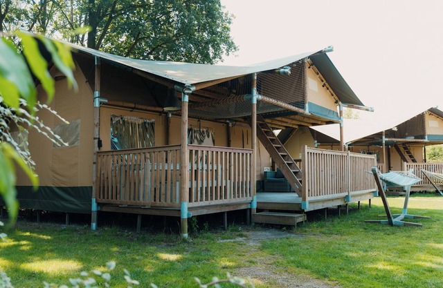 Enjoy luxury glamping in the Ranger Lodge, a spacious 6-person accommodation with modern facilities and a stunning natural setting.