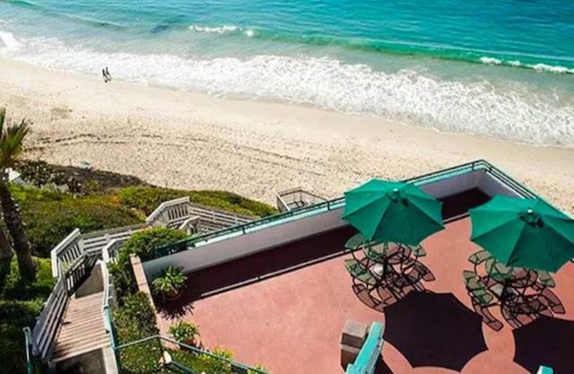 Enjoy oceanfront views in a corner suite in the Laguna Surf Resort.