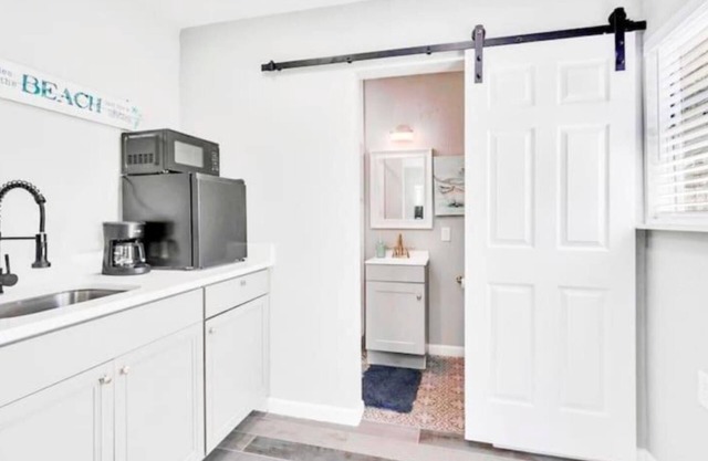 Escape to the ultimate beach vacation at The Palm Tree Bliss Beach Bungalow!