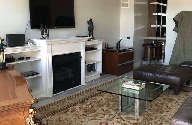 Expansive, Bright Condo with Volume Ceilings. Extra office, conference room.