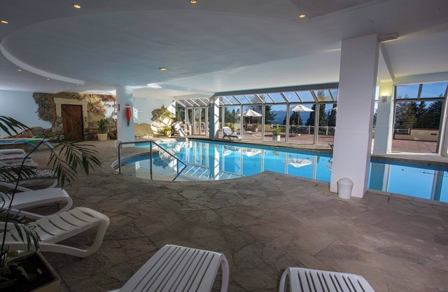 Experience Serenity – Spacious Room in Bariloche’s Natural Haven w/ Heated Pool