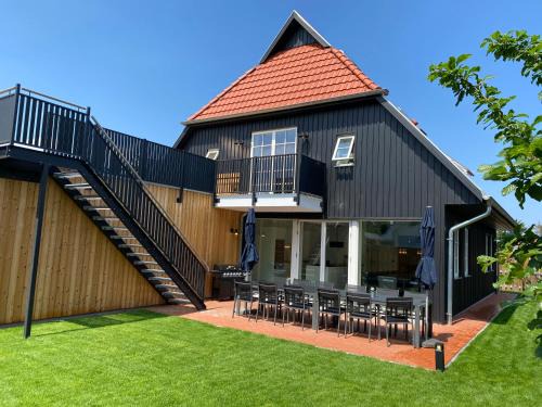 FH Magnolia fuer 12 Pers. mit Terrasse + Dachterasse