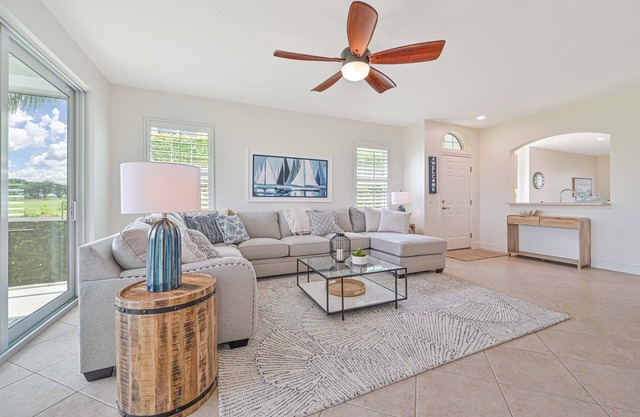 First Floor Naples coach home with Golf Course View & Resort Style Amenities!